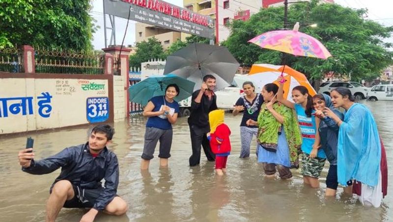 madhya pradesh heavy rain 100 year record broken in indore 12 inches rain in 24 hours floods in river kpr
