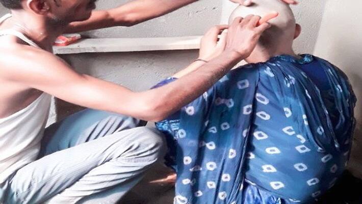 Husband shaved wife head because one hair strand came in the food, in uttarpradesh Husband shaved wife head because one hair strand came in the food, in uttarpradesh