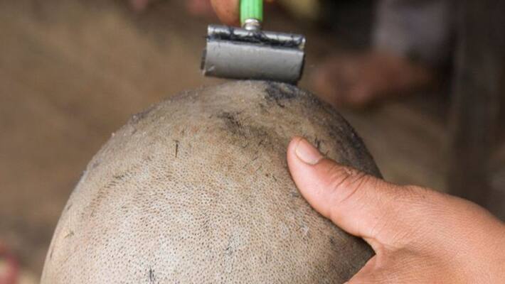 Shocking Head shaved incident for not paying debt in west godavari Shocking Head shaved incident for not paying debt in west godavari