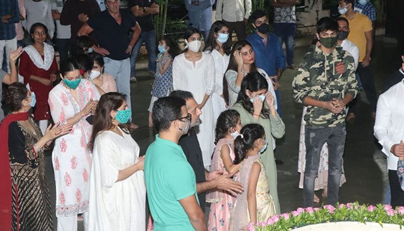 In the pictures, Salman was seen in a lavender shirt and black pants, whereas Iulia wore a light green suit. Salman signalled to the media to follow social distancing.