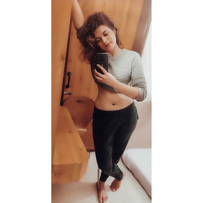 shraddha das mesmerizes the fans waering a khaki dress