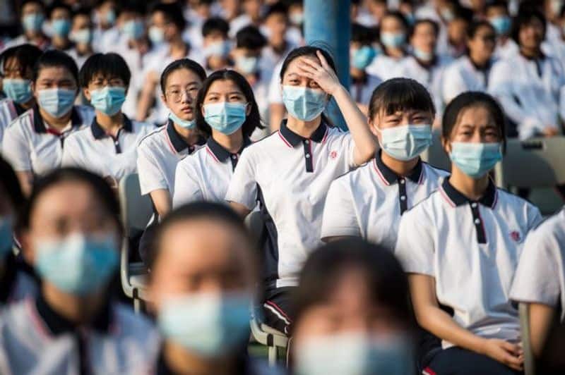 Schools open in virus-ridden city of Wuhan: China