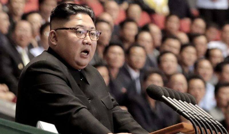 Tearful Kim Jong Un offers rare apology