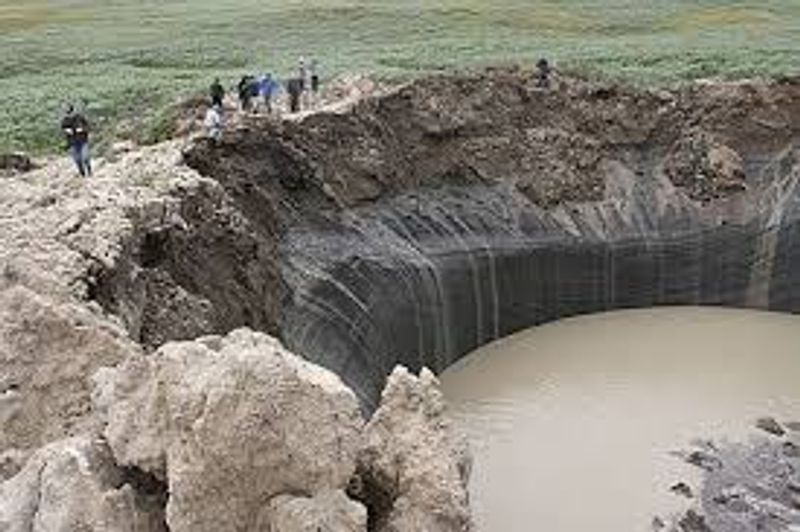 Mysterious holes nearly 100 feet deep appear in Siberias tundra region BSS