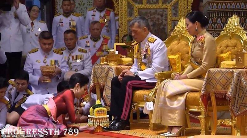 thai king rama X restores all honours of consort sineenat who was  stripped of all positions last year
