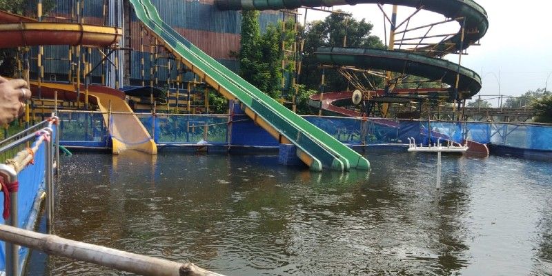 Workers starts fishary in a water park in Durgapur BTG