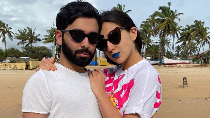 saif ali khan's daughter sara ali khan reading book in swimming pool wearing pink bikini KPJ