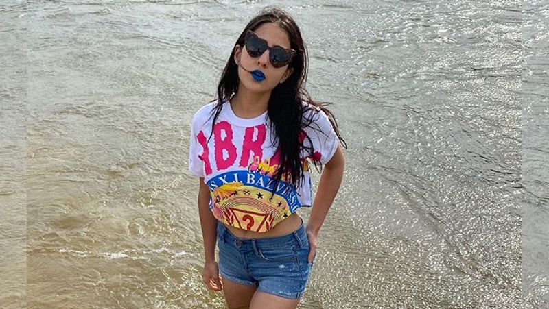 saif ali khan's daughter sara ali khan reading book in swimming pool wearing pink bikini KPJ