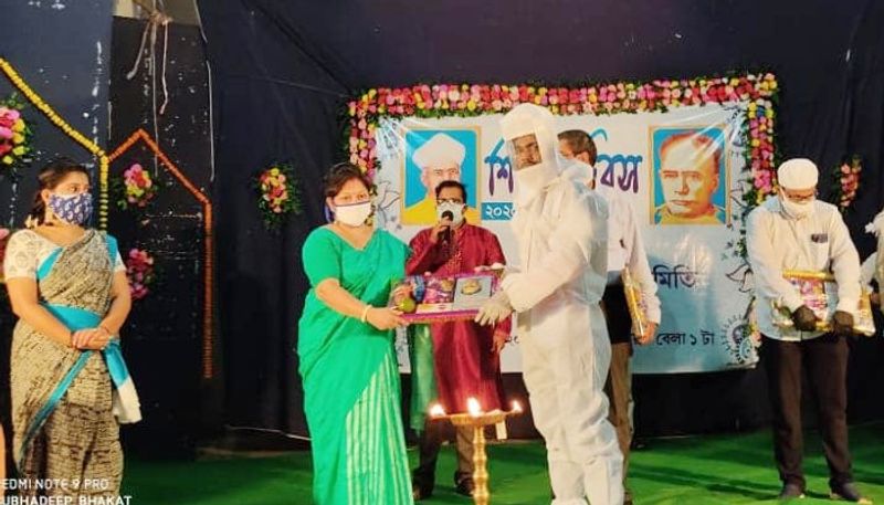 Teachers felicitated in teachers day by wearing ppe kit in Midnapore BTD