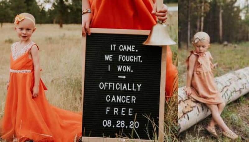 4 year old girl celebrates being cancer free