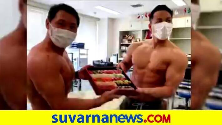 Bodybuilders Are Delivering food For A Japanese Restaurant Bodybuilders Are Delivering food For A Japanese Restaurant