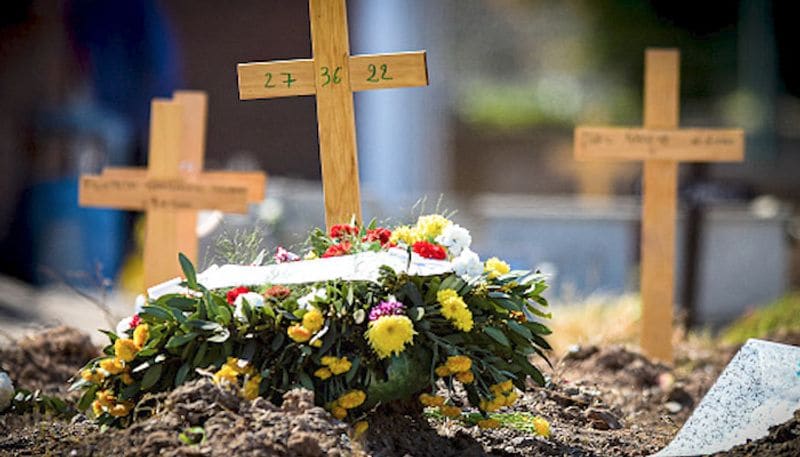 Why do people place flowers on graves-snj