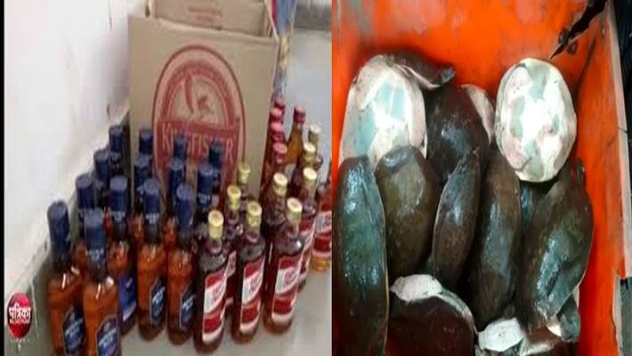 cement mixer carrying 1140 liquor bottles seized in Andhra pradesh cement mixer carrying 1140 liquor bottles seized in Andhra pradesh