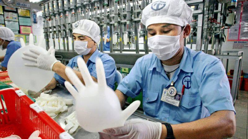 more than 1000 affected with covid, top glove closes half of its factories