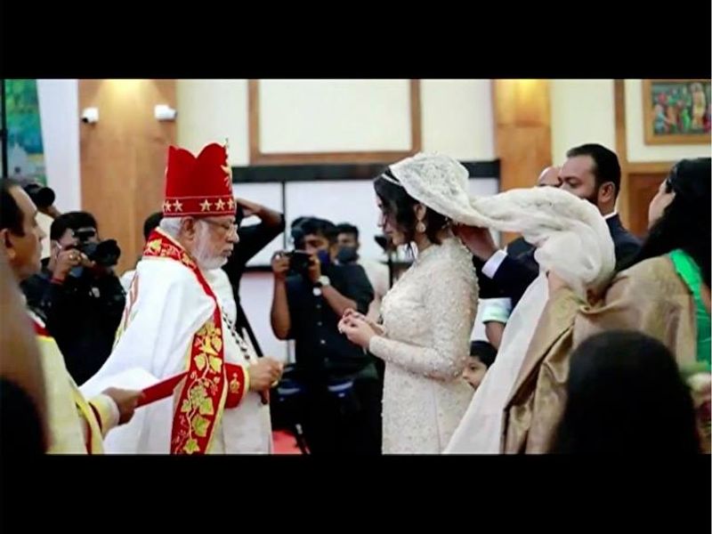 pictures of Miya in wedding dress wearing a mask photos