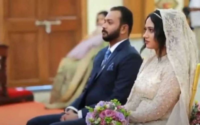 pictures of Miya in wedding dress wearing a mask photos