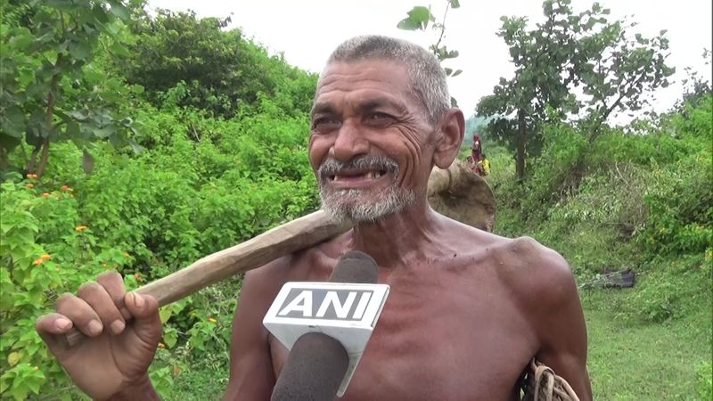 man has carved out a canal to take rainwater to home village in bihar