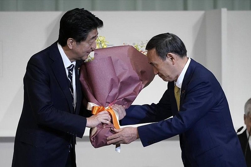 Yoshihide Suga elected as Japans new prime minister will succeed Shinzo Abe BSS