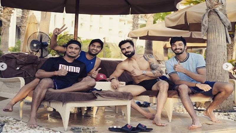 virat kohli shared his photo in swimming pool, fans comment hay garmi dva