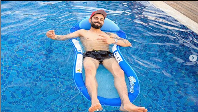 virat kohli shared his photo in swimming pool, fans comment hay garmi dva