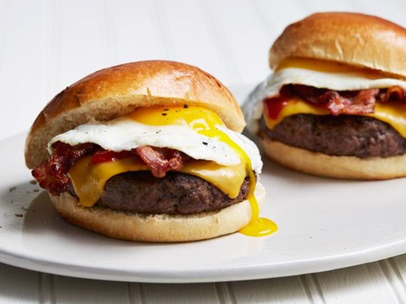 Egg Burger: Nothing's better than a breakfast burger. It's not only filling and delicious but also full of healthy elements. Try your breakfast burger by placing a cookie cutter on a pan. Add a seasoned egg into it and let it cook. Once done, place it on a wheat burger bun and add mustard sauce and fresh veggies on the egg patty. Now you have your yummy breakfast in a handy one piece.