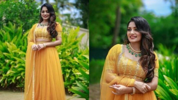 Actress and malayalam acnhor arya babu s new photoshoot images with her new yellowish lehanka choli Actress and malayalam acnhor arya babu s new photoshoot images with her new yellowish lehanka choli