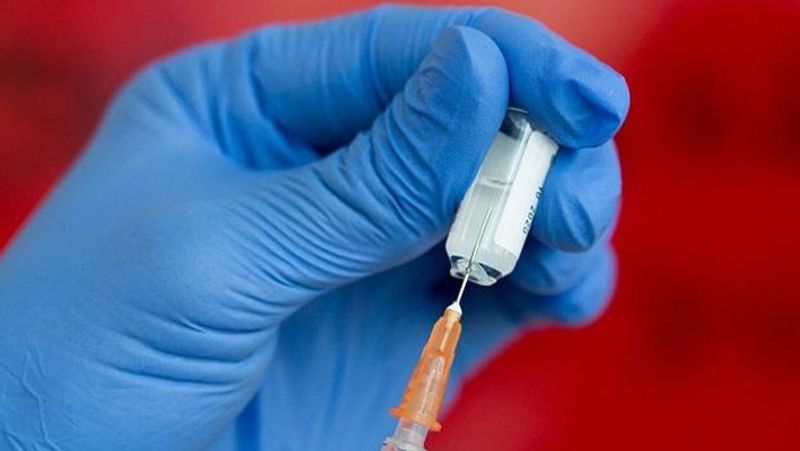 coronavirus vaccine johnson and johnson postponed trail after illness of volunteer bsm