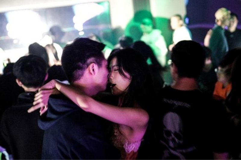 World struggles with Covid, Origin Wuhan in China its party time in night clubs and pubs photos