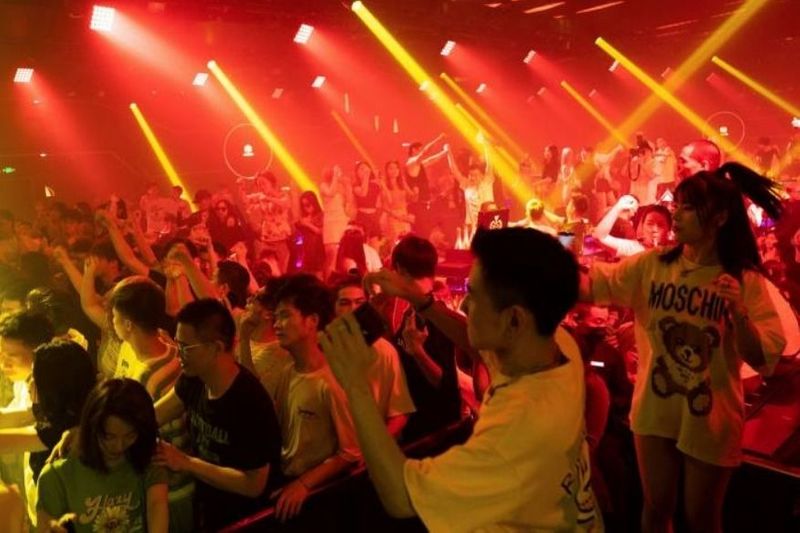 World struggles with Covid, Origin Wuhan in China its party time in night clubs and pubs photos
