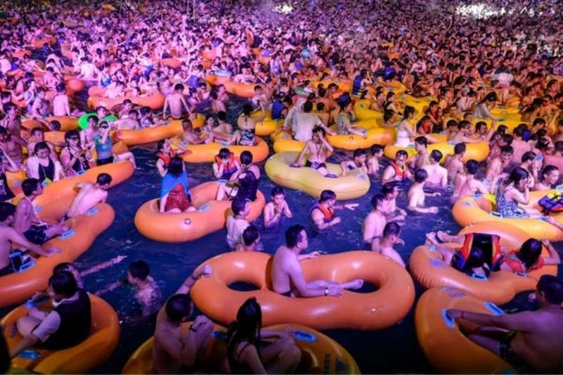 World struggles with Covid, Origin Wuhan in China its party time in night clubs and pubs photos