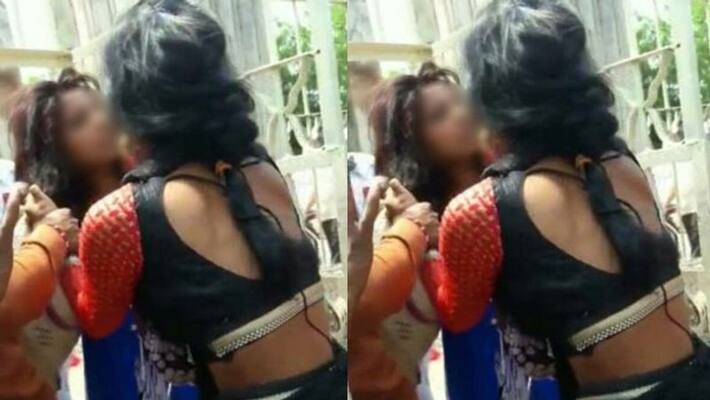 punjab woman had put her photo with husband on facebook girlfriends beaten sticks punjab woman had put her photo with husband on facebook girlfriends beaten sticks