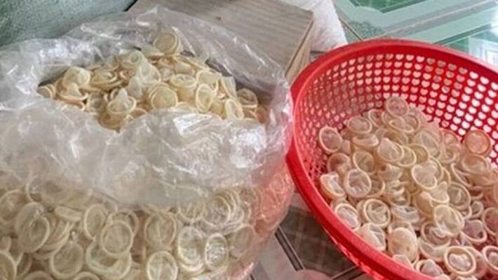 police raid in warehouse were used condoms recycled and packed in new cover police raid in warehouse were used condoms recycled and packed in new cover