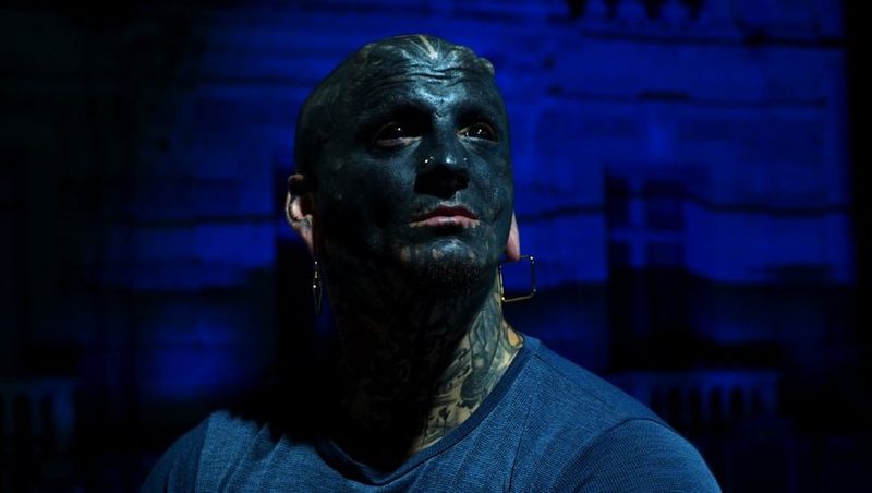 Man transforms himself into black alien by having nose REMOVED