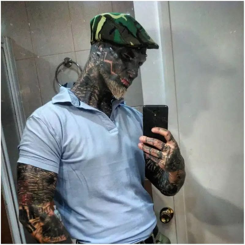 Man transforms himself into black alien by having nose REMOVED