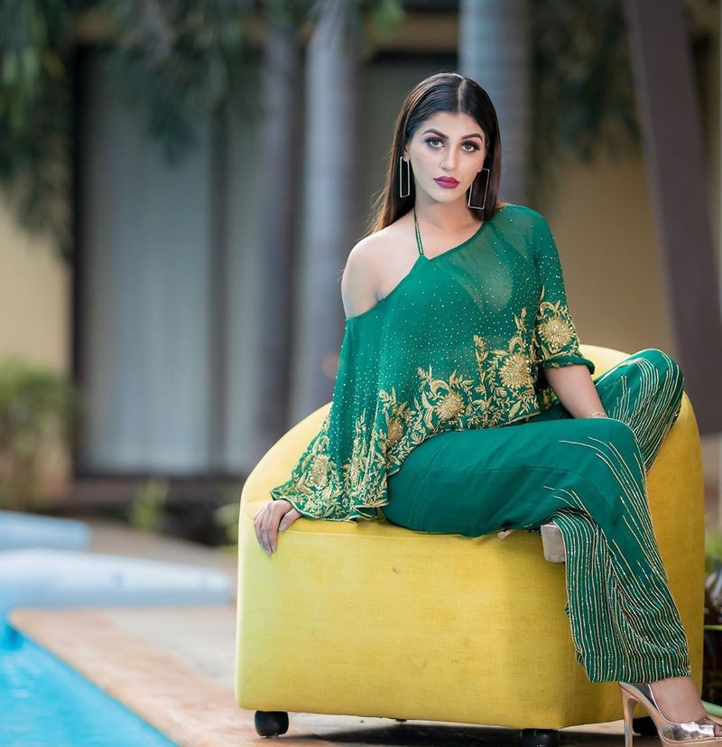 Bigg Boss Fame Yashika anand Green transparent dress hotness over loaded photos