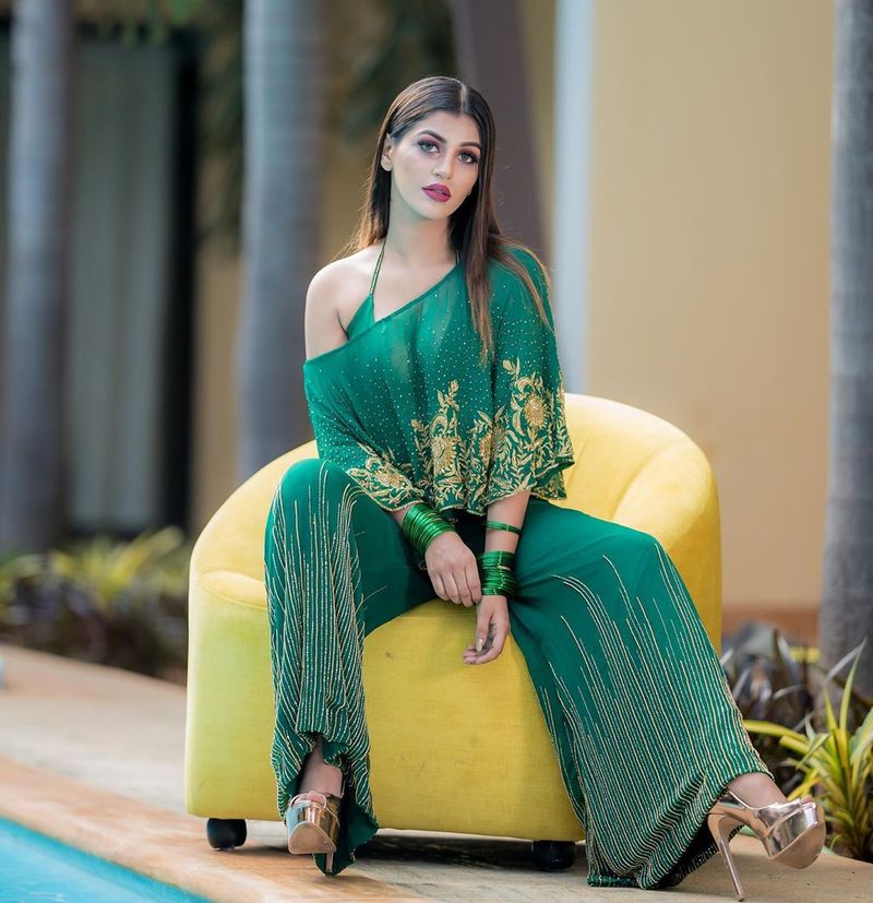 Bigg Boss Fame Yashika anand Green transparent dress hotness over loaded photos