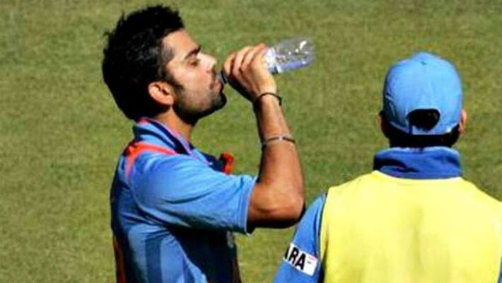 fitness freak virat kohli drinks black water and its price is 4000 per litre fitness freak virat kohli drinks black water and its price is 4000 per litre