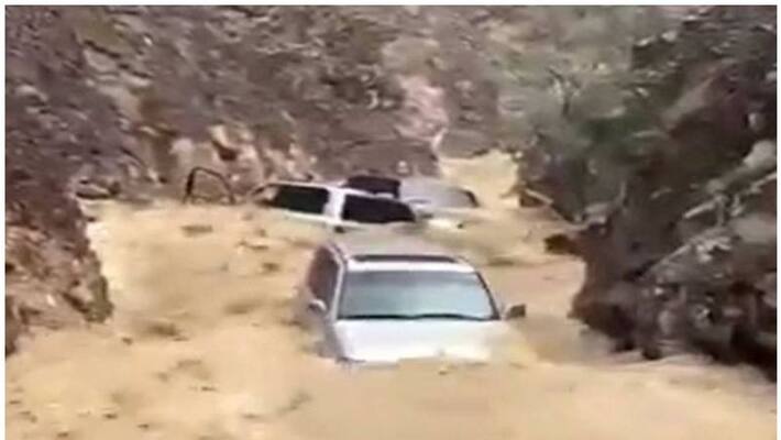 four cars swept away in a flood in Sharjah four cars swept away in a flood in Sharjah
