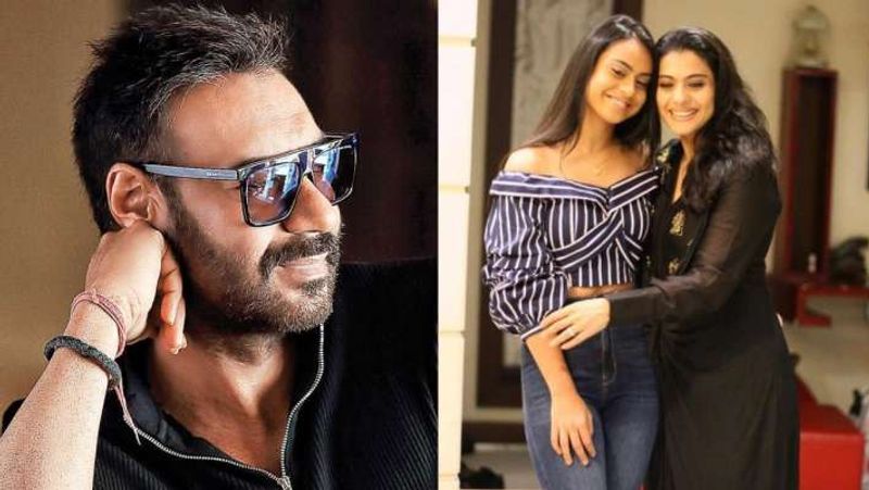 bollywood actress kajol tries to hit husband ajay devgn by her sandal