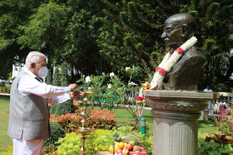 Governor Vajubhai Vala Garlanding Mahatma Gandhi At Raj Bhavan snr