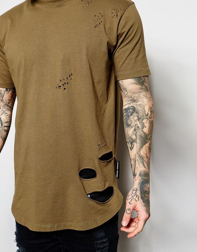 A brand is selling mens tee with holes on the sides; asking to be tickled say netizens dpl