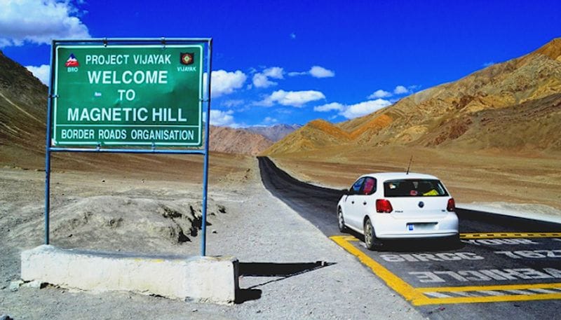 3. Anti-gravity hills in LadakhWith the anti-gravitational effect, this is the only magnetic hill in India. Objects and cars on the hill road may appear to roll uphill in defiance of gravity when they are, in fact, rolling downhill. This is landmarked by a yellow notice board that gives out instructions to place your car on neutral gear right on the spot marked by white paint, which will leave you surprised as your car will begin to move uphill on its own.