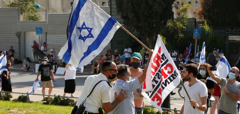 New law to curb anti-government protesters Israelis shouting slogans