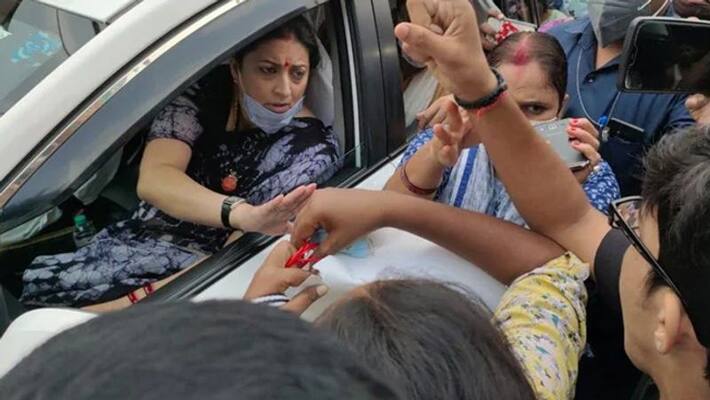 Congress workers block Union minister Smriti Irani in varanasi Congress workers block Union minister Smriti Irani in varanasi