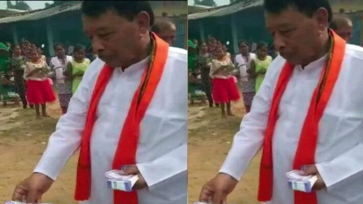 madhya pradesh BY-election minister bisahulal singh photo viral to distribute note KPR madhya pradesh BY-election minister bisahulal singh photo viral to distribute note KPR