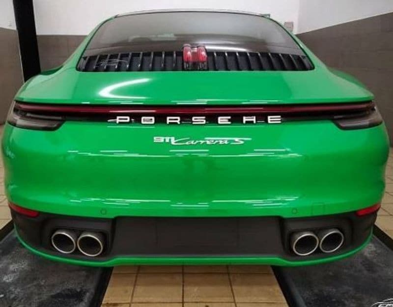Fahadh Faasil and actress Nazria Nazim with their new Porsche 911 Carrera