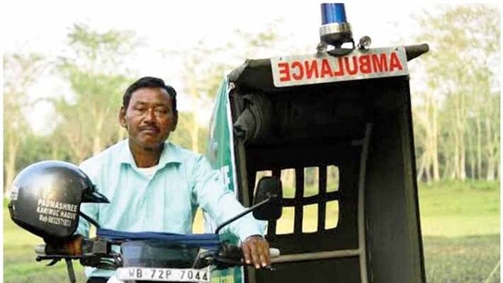 Bike -ambulance Dada who ferries patients to the hospital Bike -ambulance Dada who ferries patients to the hospital