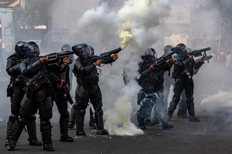 New Environment and Labor Law Indonesian people fighting in the streets