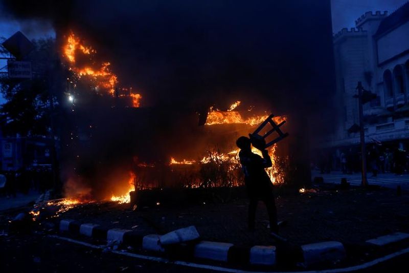 New Environment and Labor Law Indonesian people fighting in the streets