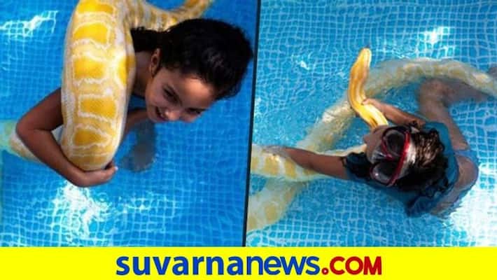 8 year old girl swims with pet python dpl 8 year old girl swims with pet python dpl